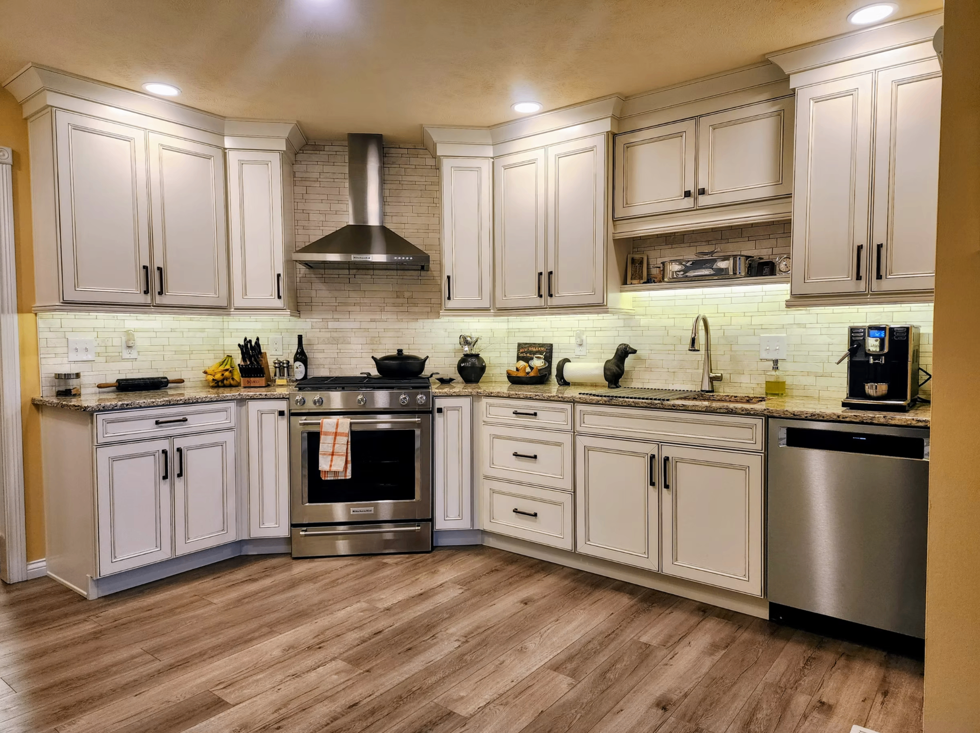 Glazed custom cabinetry with professional range